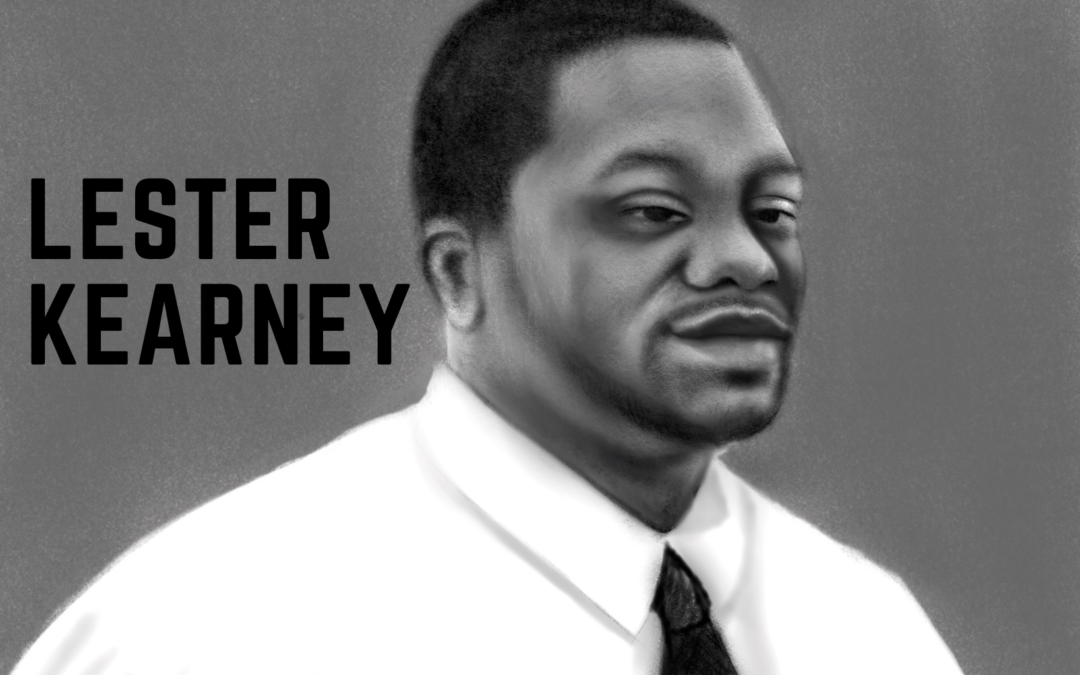 A black and white image of Lester Kearney wearing a white shirt and black tie with his name next to him.