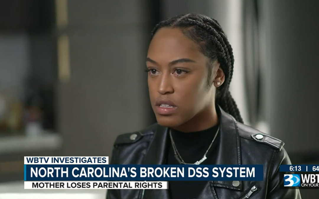 Screenshot of Toia Potts, a Black woman wearing a black jacket, being interviewed on WBTV. The chiron says WBTV investigates North Carolina's broken DSS system; mother loses parental rights