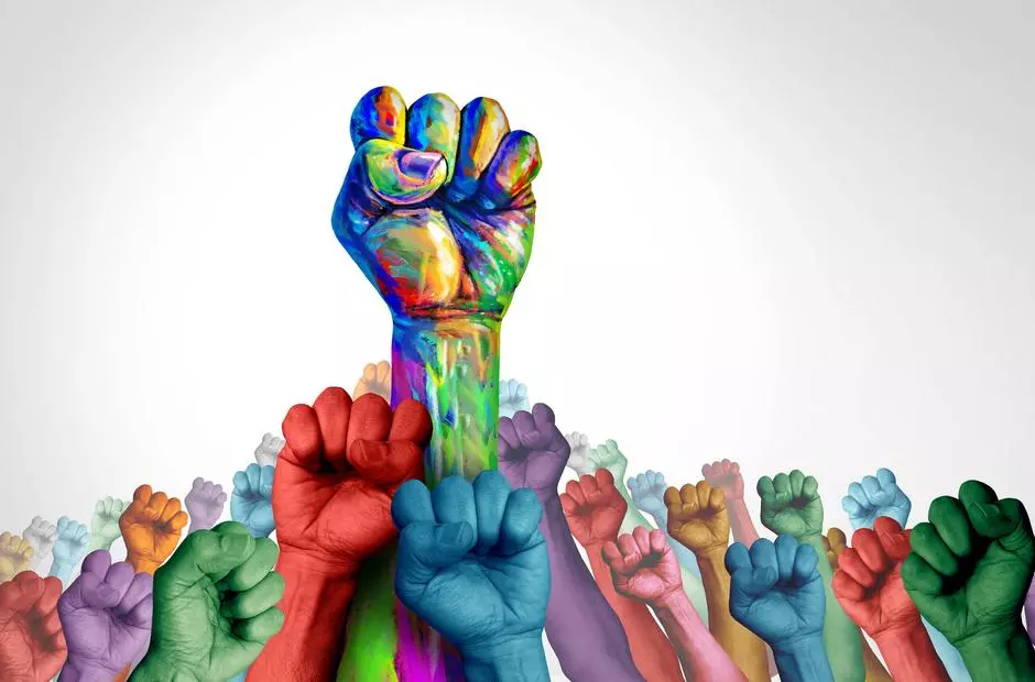 Multi-colored fists rise together around one prominent rainbow-colored fist